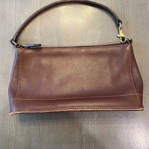 Brown leather coach wristlet